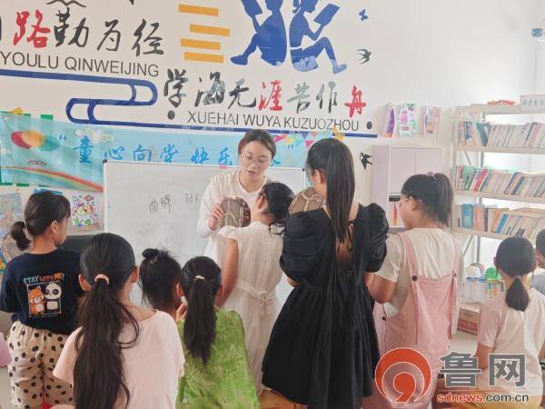 胶州市开展“童心传承八角鼓 非遗课堂进社